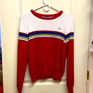 This is a medium/small sweater